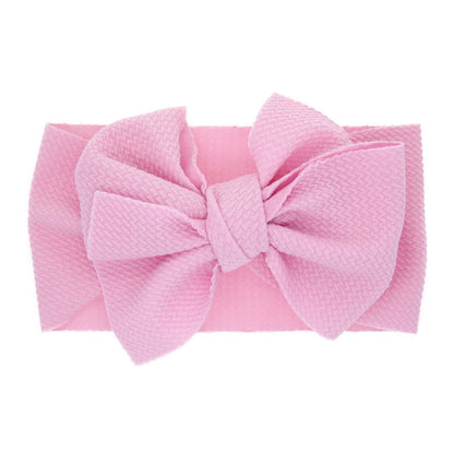 New-born baby's solid-colored bow headband
